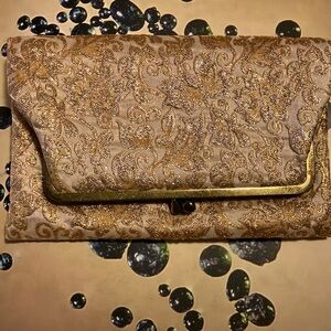 Cute, gold fabric Vintage clutch.